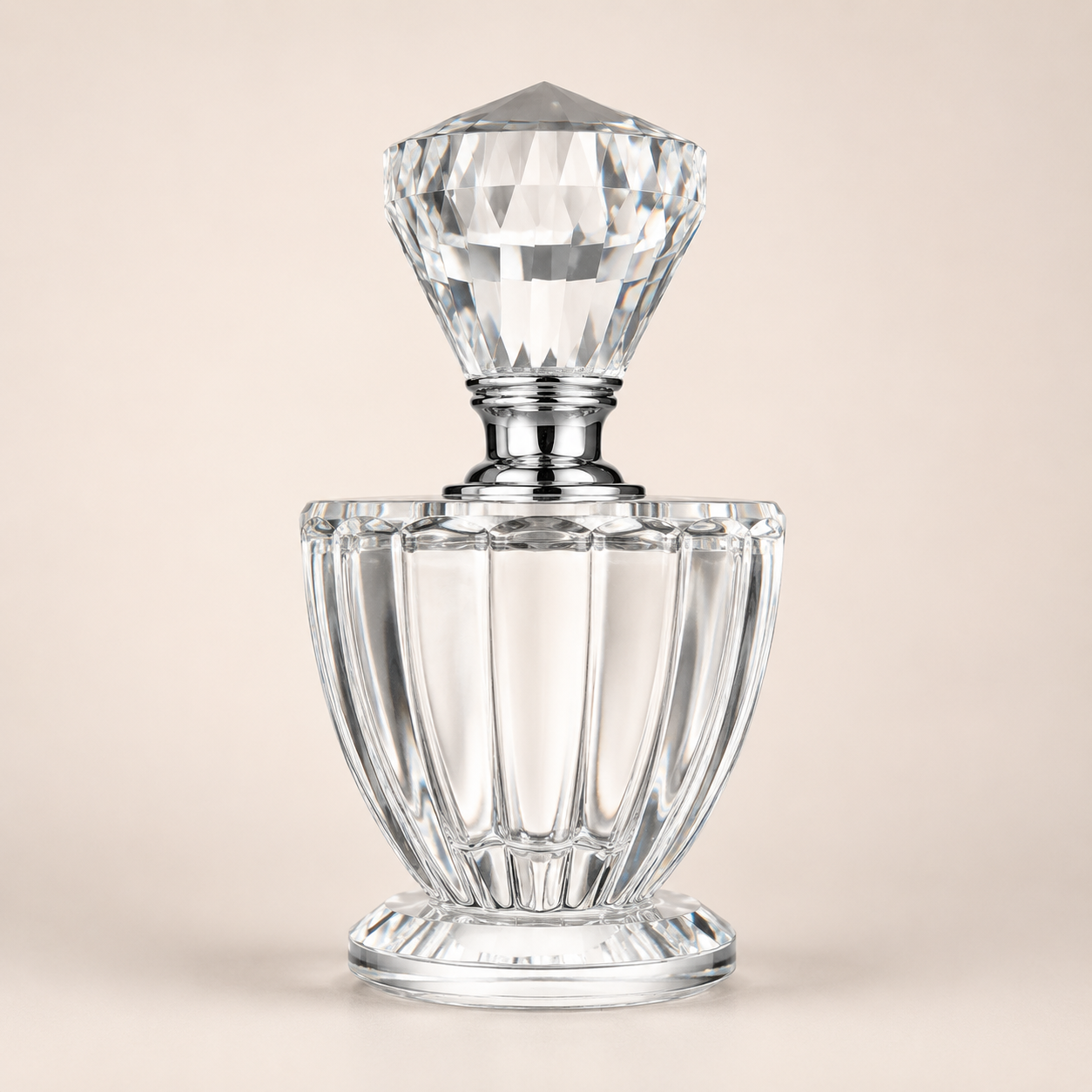 Clear Crystal Perfume Bottle photographed on a warm beige studio background