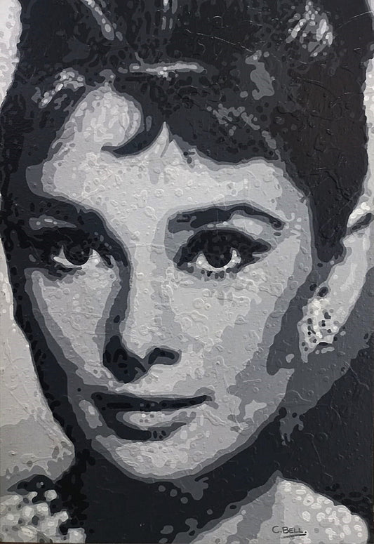 Black and white oil painting of Audrey Hepburn’s face, rendered in expressive brushstrokes with dramatic contrast and soft lighting.