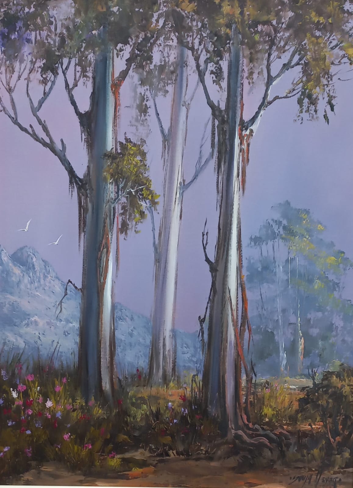 Oil painting of a white cottage beside a river with laundry hanging on a line, mountains in the background under a bright blue sky.