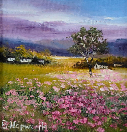 Oil painting of a field of pink flowers with a lone tree and distant mountains under a soft lavender sky.