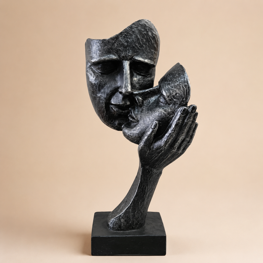 Black Lovers Sculpture photographed on a warm beige studio background