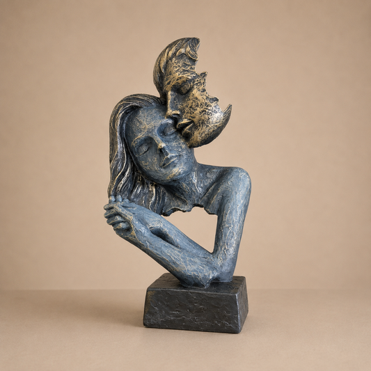 Blue Lovers Sculpture photographed on a warm beige studio background