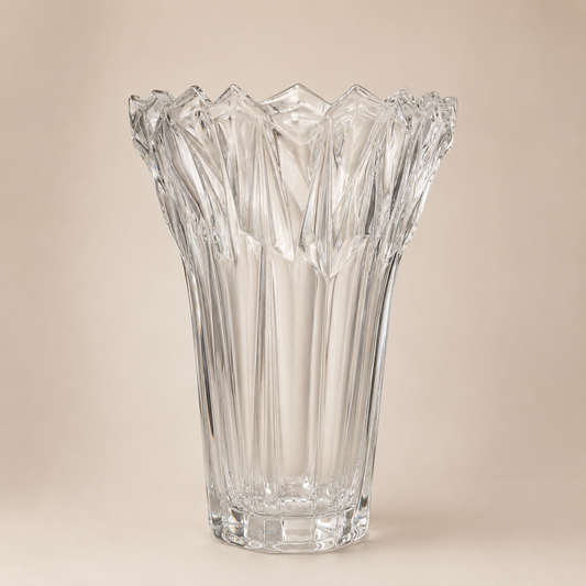 Clear Ribbed Crystal Vase photographed on a warm beige studio background