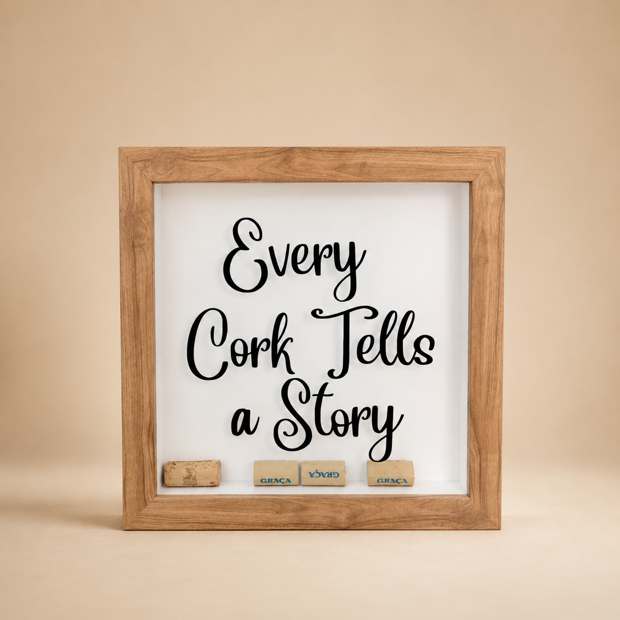 Every Cork Tells a Story Framed Sign – White photographed on a warm beige studio background