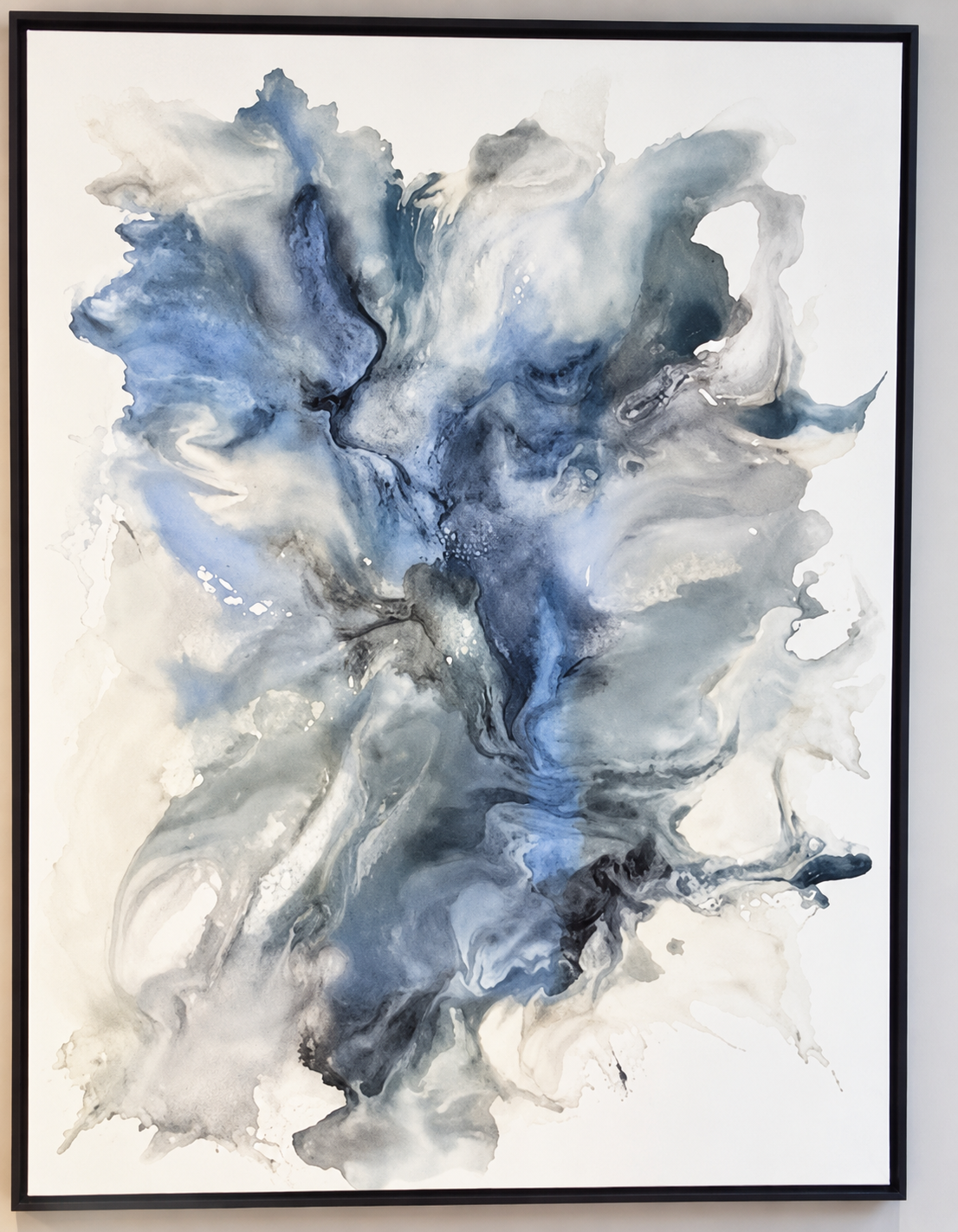 Ewaldi artwork: A soft branching plume of blue-grey and smoky black fluid appears within a narrow black picture frame.