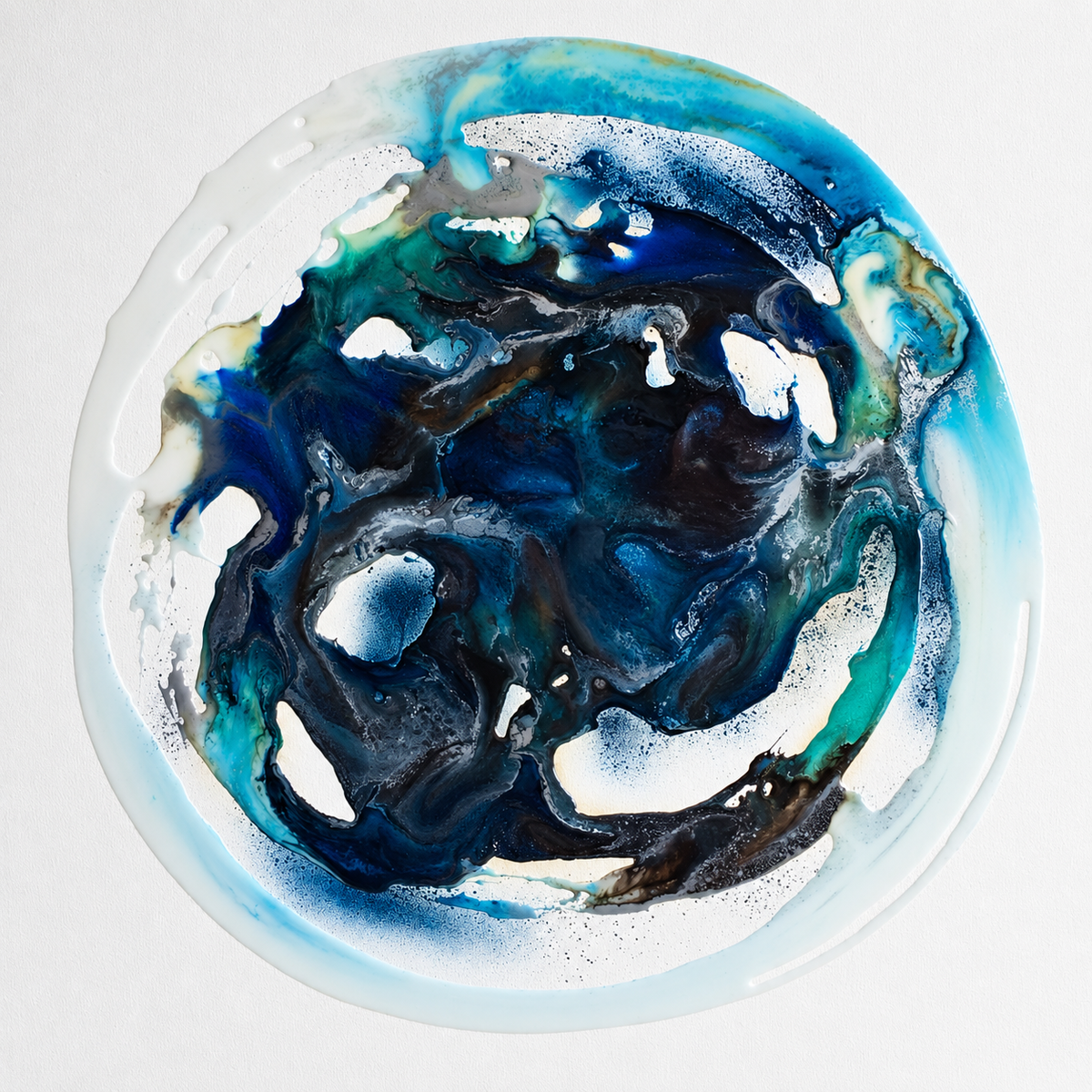 Ewaldi artwork: A dark, inky central whirlpool is encircled by irregular white and turquoise marbling inside a softly.