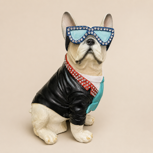 French Bulldog with Blue Glasses Figurine photographed on a warm beige studio background