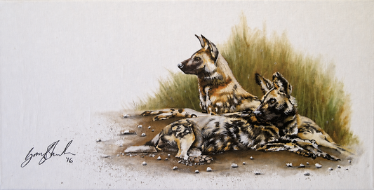 Gary Streak original oil painting on stretched canvas depicting two African wild dogs resting beside tall grass in a spacious natural setting