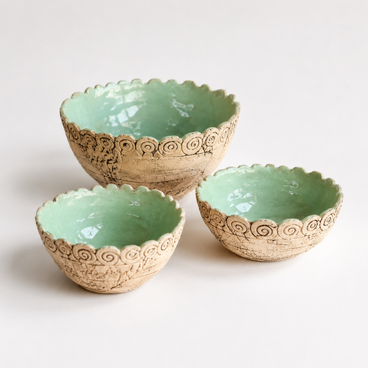 Handcrafted Mint Green Ceramic Bowls photographed on a warm beige studio background