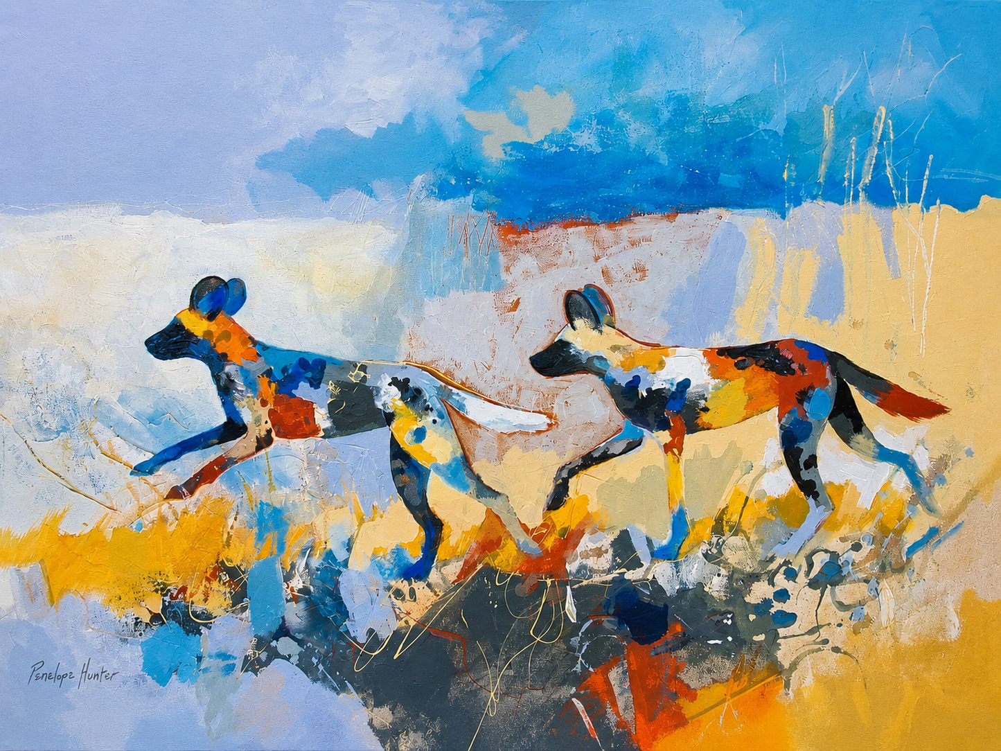 Penelope Hunter original acrylic painting on stretched canvas depicting African wild dogs running through a colourful blue and golden savanna