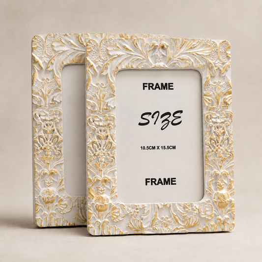 White and Gold Ornate Photo Frames – Pair photographed on a warm beige studio background