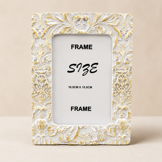 White and Gold Ornate Photo Frame photographed on a warm beige studio background